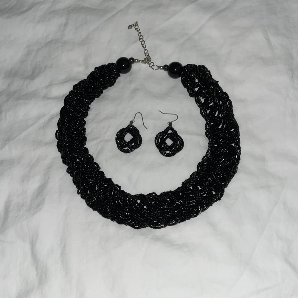Black bead necklace/choker with matching earrings.